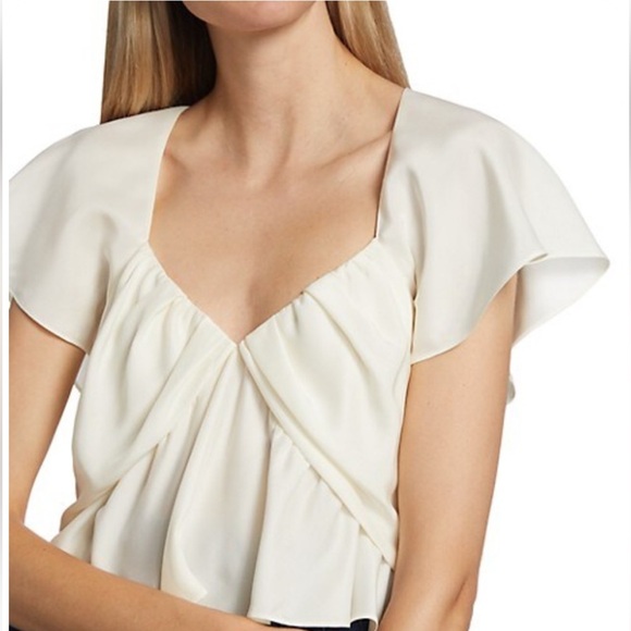 Frame Denim Tops - FRAME DENIM
SHIRRED FLOUNCE TOP - OFF WHITE
$369.00 size L